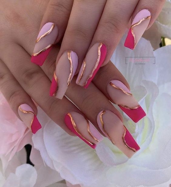 Overall view of striped light pink and bold pink nail designs