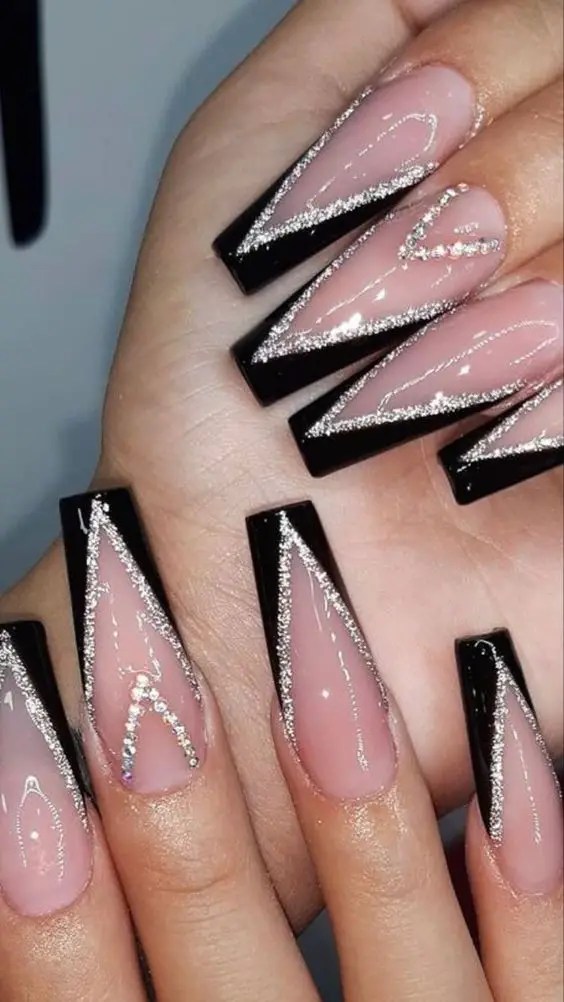 You can't go wrong with pink and black tipped nails