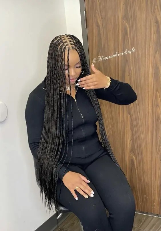 Women show off their long braids.