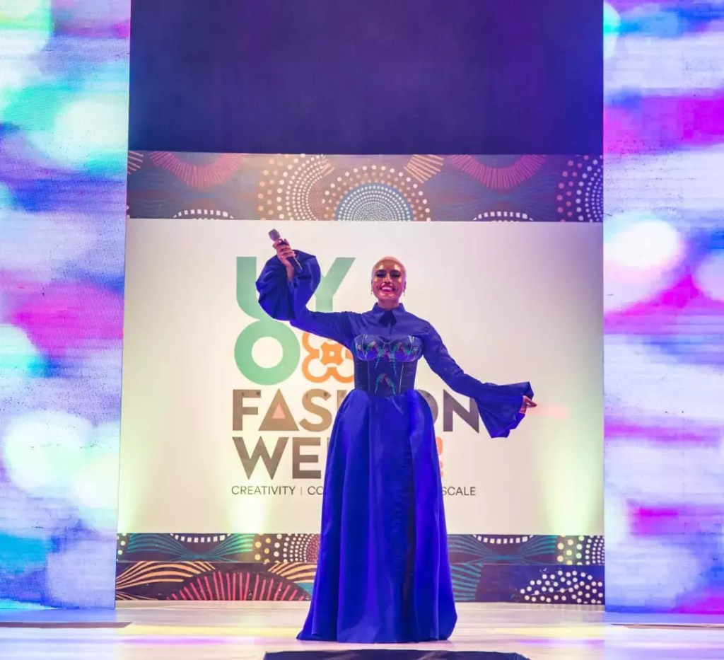 Host Nancy Ishime rocks a maxi blue dress at Uyo Fashion Week