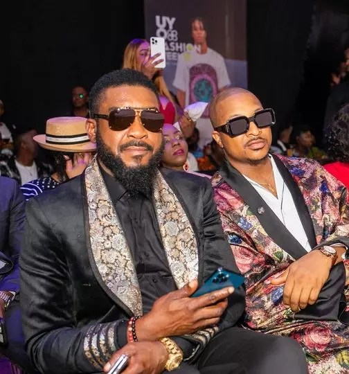 Iku Ogbonna and Chidi Mokeme attend Uyo Fashion Week in well-tailored suits.