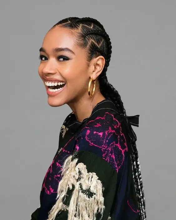 Smiling woman rocking her zigzag stitched braid