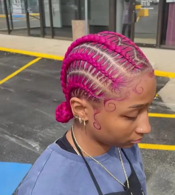Woman rocking her pink stitched braid