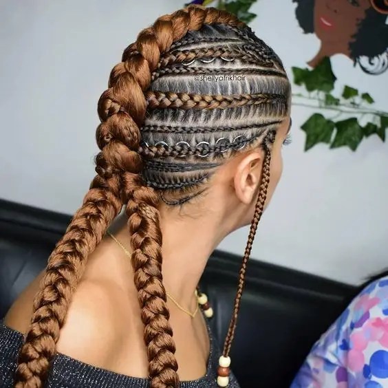 Woman showing back view of mohawk braids