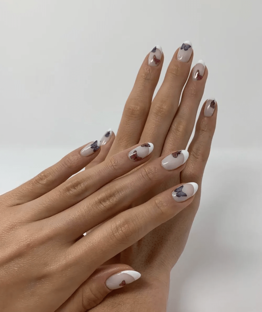 This butterfly look is the trending minimalist nail design in 2023.