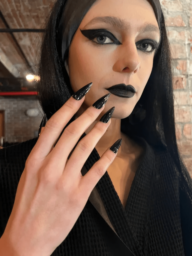 Nail Design 2023: Gorgeous Woman Giving Off Wednesday Addams Vibes Rocking Black Nails