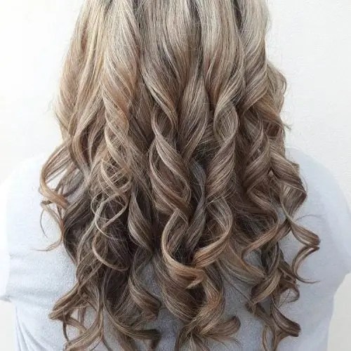 Beautiful dirty blond hair with curly waves.