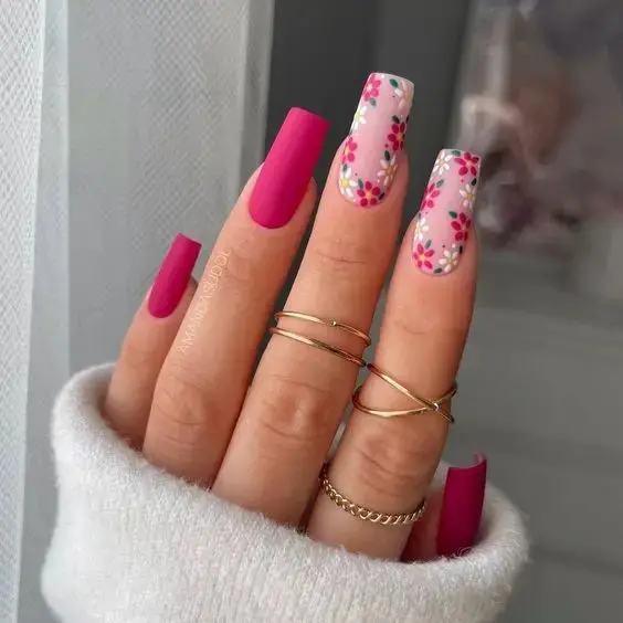 Matte pink polish and light pink with some floral prints  is one of the cute nail designs to try out.