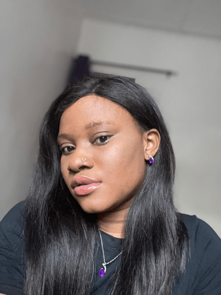 Victoria Willie wearing a nose ring of purupu jewellery.