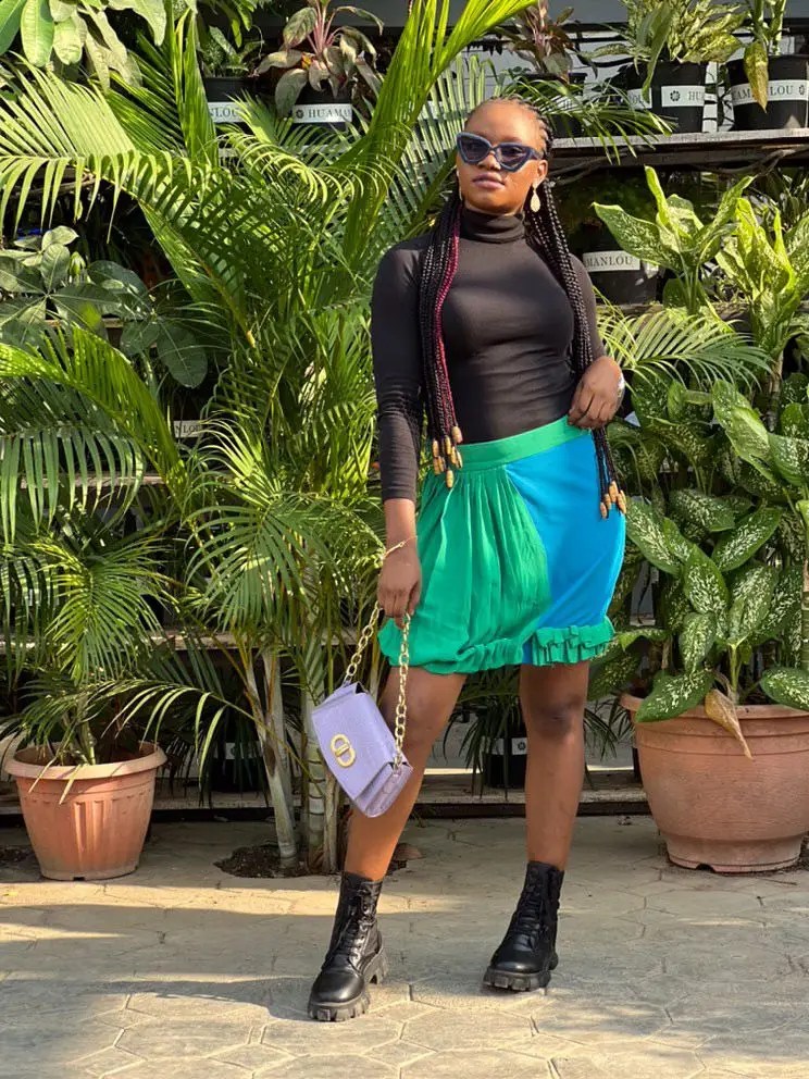 Victoria Willie rocking a ria kosher blue and green skirt