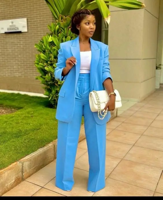 Woman in blue suit demonstrating how to dress for church