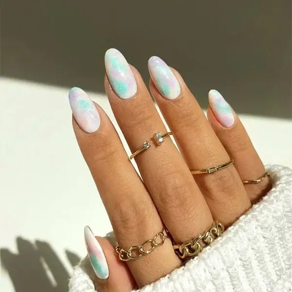 Soft pastels are one of the cute nail designs that can decide your locks this season.