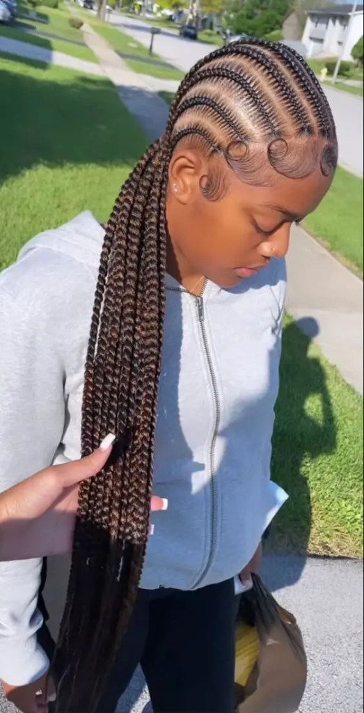 Cute black girl rocking tiny braids