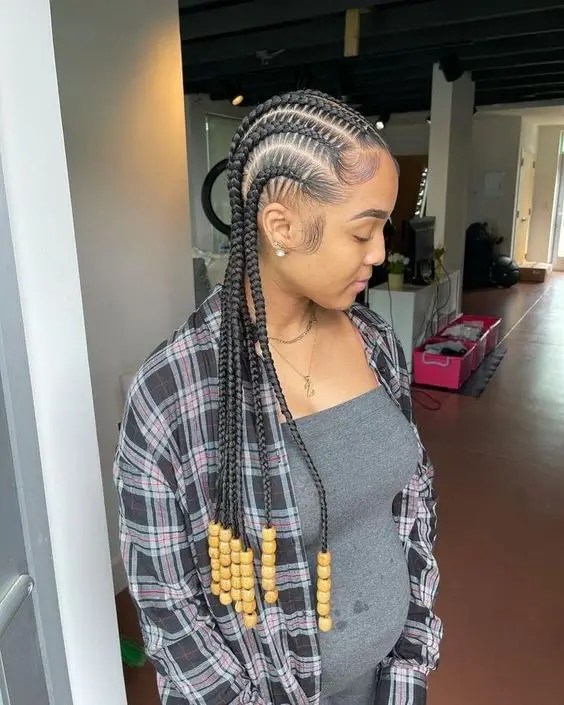 Woman with Baby Bump Rocking Beaded Braids