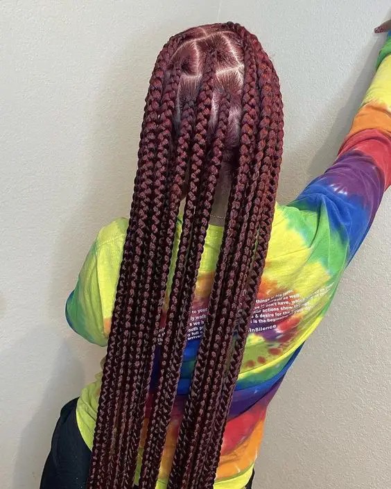 Back view of bright red knotless braid
