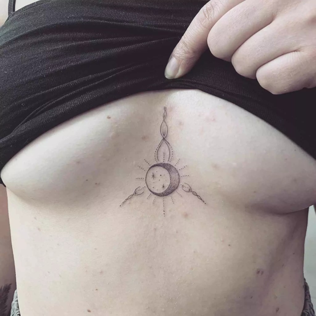 Women show off beautiful moon sternum tattoo designs.