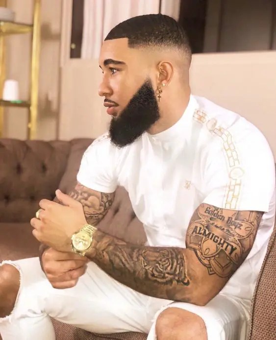 Side view of man rocking mid fade haircut