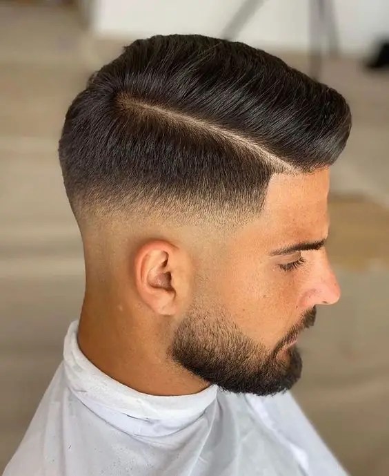 A man showing off his side-parted hairstyle
