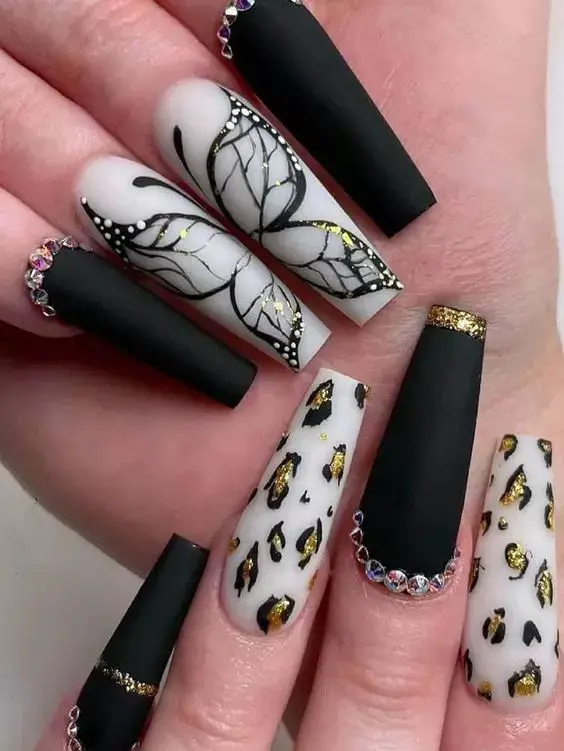 This cute nail design comes with shiny accessories and gold polka dots.