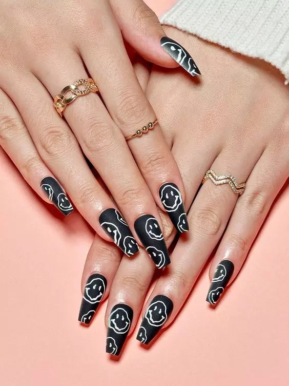 The beautiful and cute nail design is gorgeous with the ring.