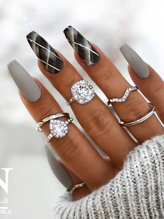 A perfect blend of ash polishes to create a cute nail design and some accessories to match it.