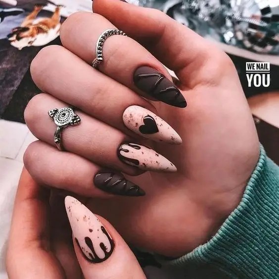This beautiful nail art is all you need for summer. Pink and chocolate manicure for the win.
