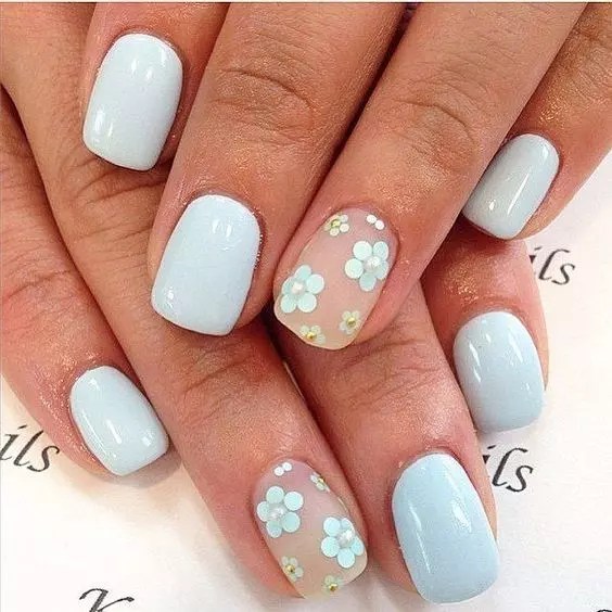 Light blue and floral patterns are one of the cute nail designs, perfect for casual coordination.