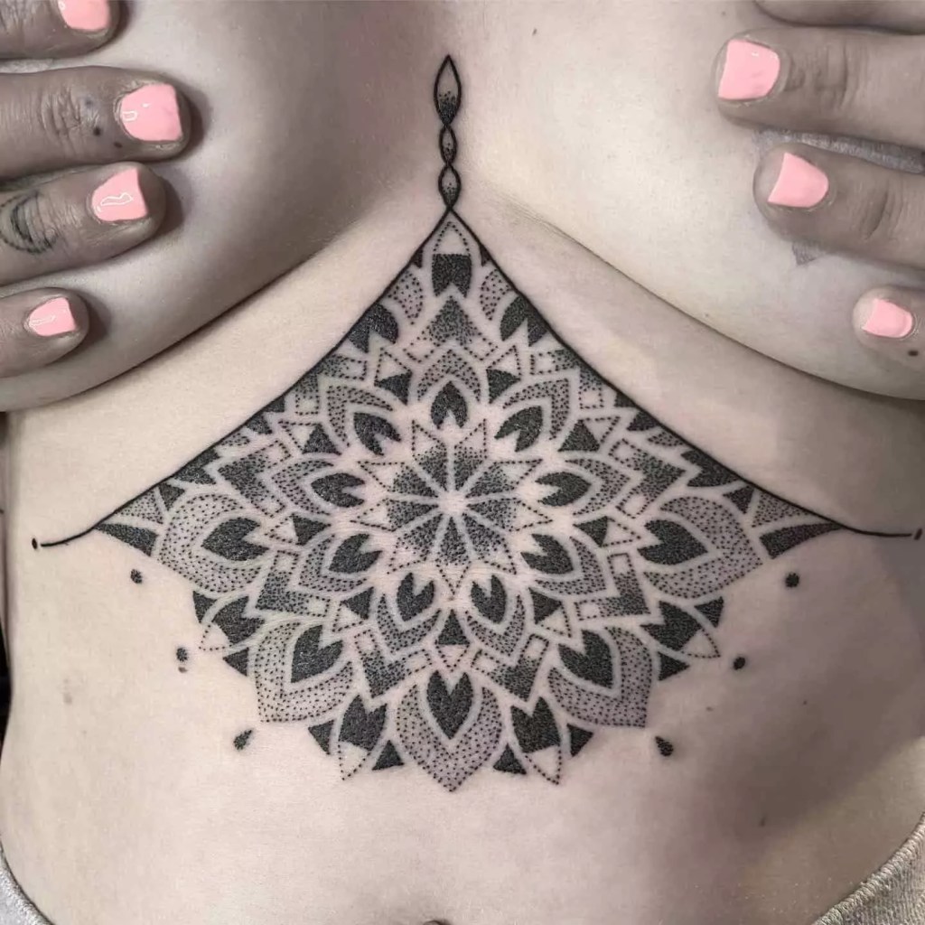 Women show off their mandala tattoo designs.