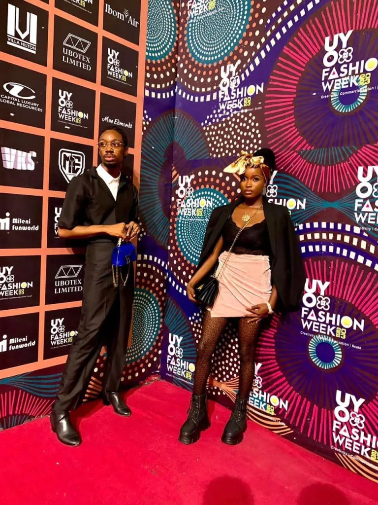 A man and a woman show off their iconic street style looks on the red carpet.