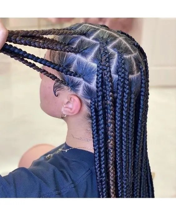 Women show off gorgeous knotless braids.