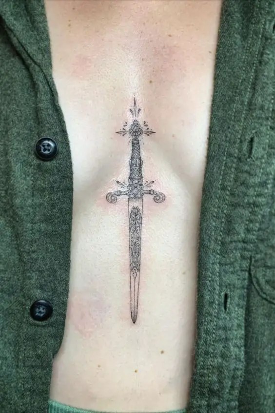 Front view of sword sternum tattoo design