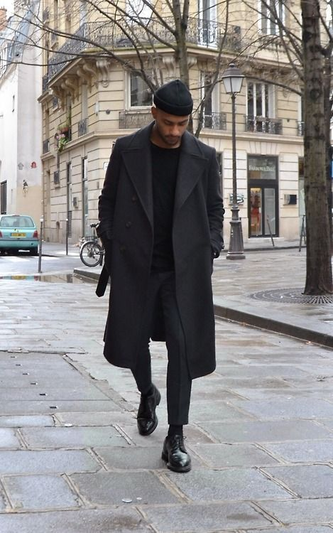 man dressed in all black