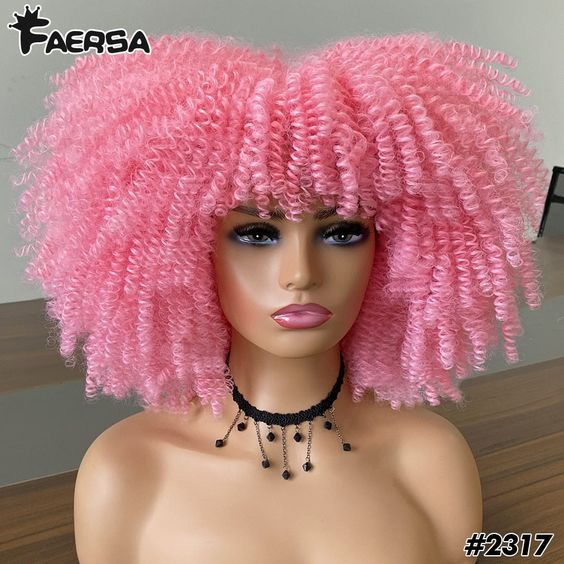 pink synthetic wig on mannequin