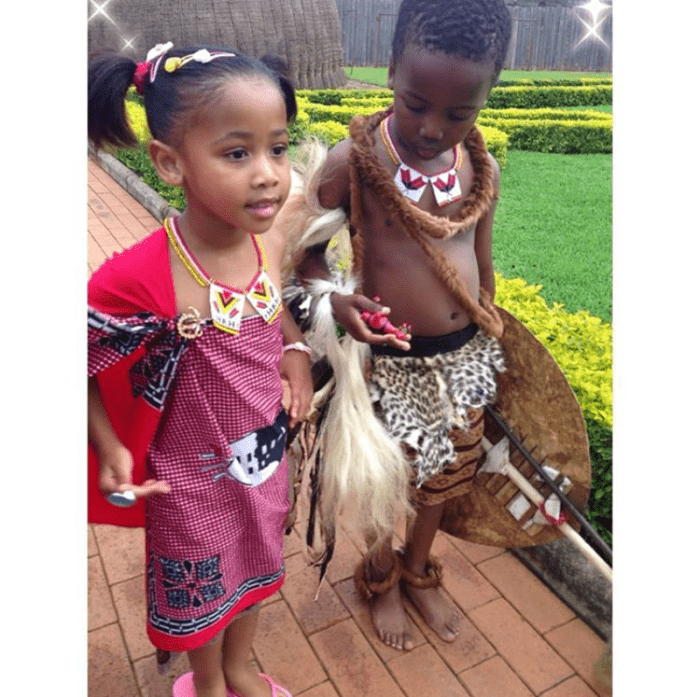 Boys and girls in traditional Swazi costumes