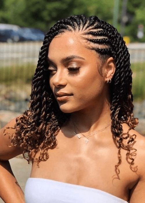 Woman wearing cornrows with attachments for styling natural short hair