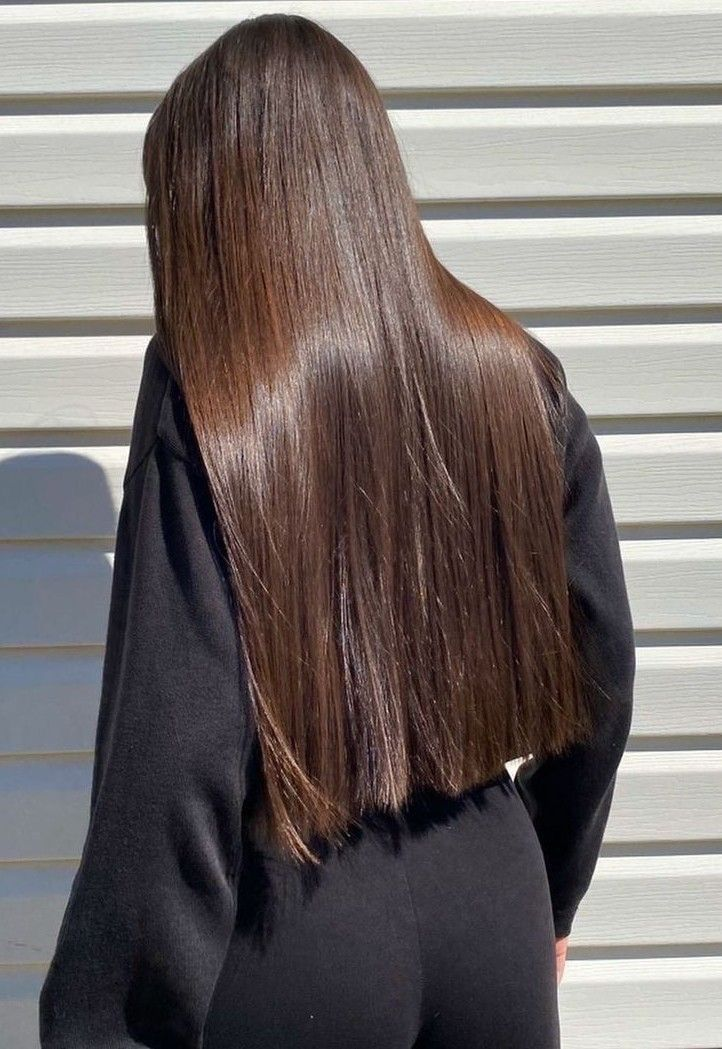 Woman wearing long blunt cut hairstyle
