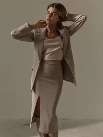 lady wearing suit on a midi pencil skirt