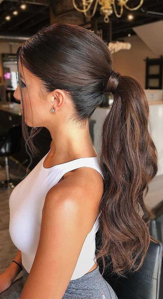 Woman wearing long ponytail hairstyle
