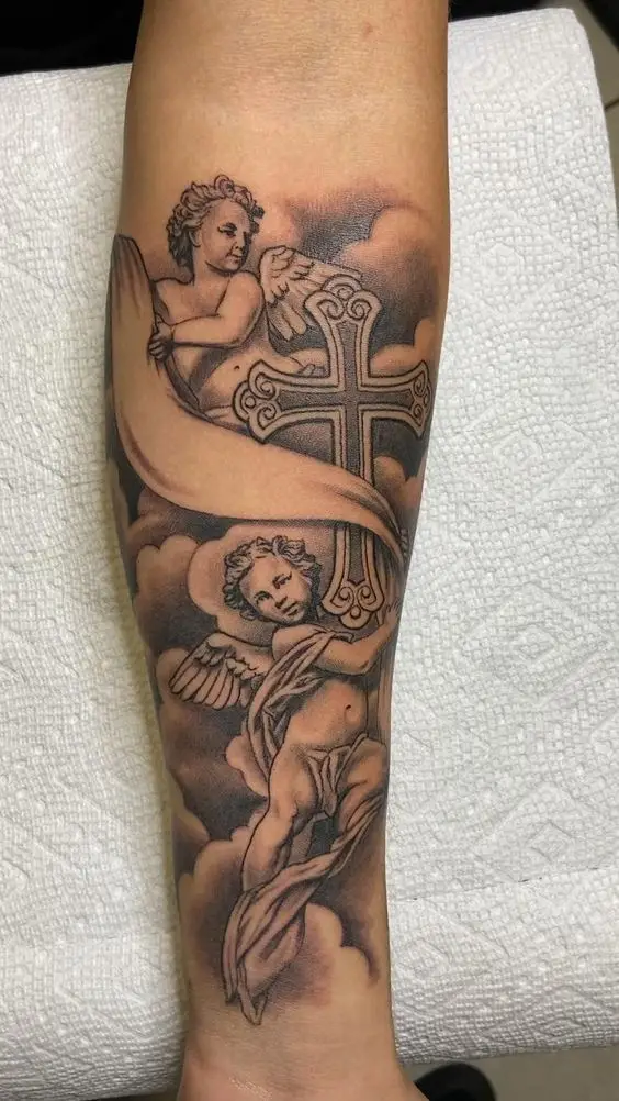 lady wearing religious theme half sleeve tattoo