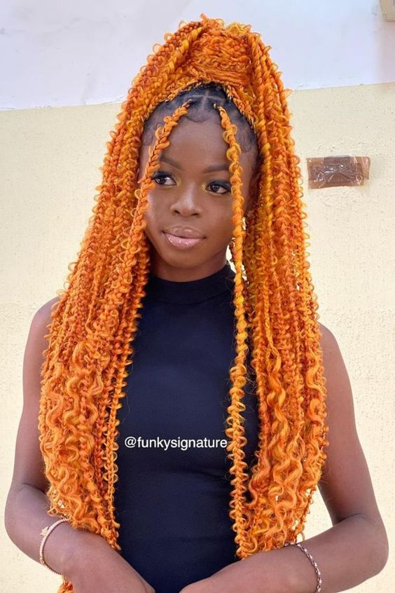 Woman wearing orange butterfly braid