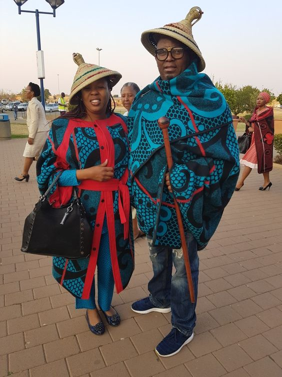 Men and women in traditional Sotho costumes
