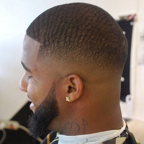 black man with low cut male hairstyle