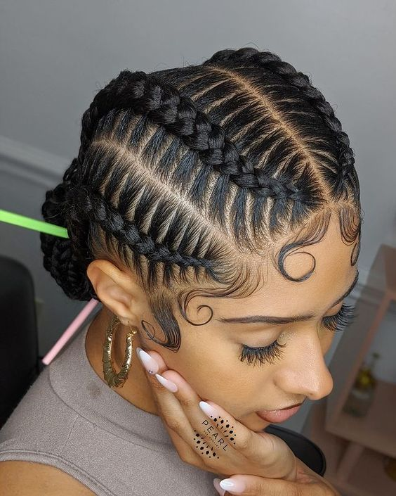 Pretty woman wearing feed-in braid hairstyle