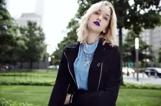lady using lipsstick as fashion accessory