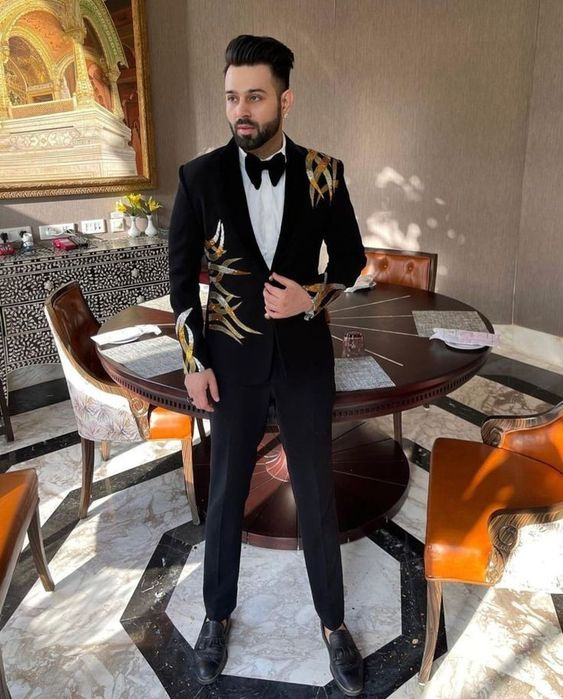 man wearing men's decorated dinner jacket prom outfit