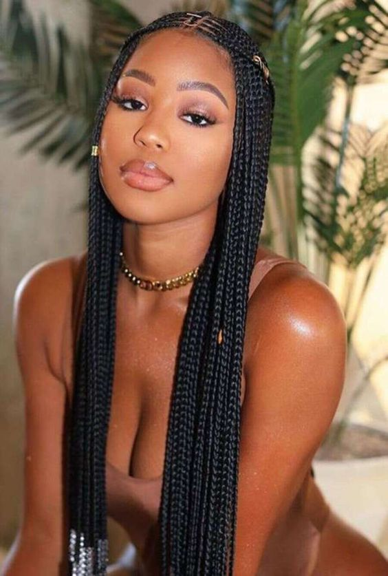 Pretty woman rocking african braids with beads