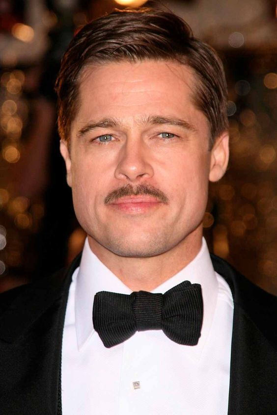 Brad Pitt wearing a farewell pencil mustache style