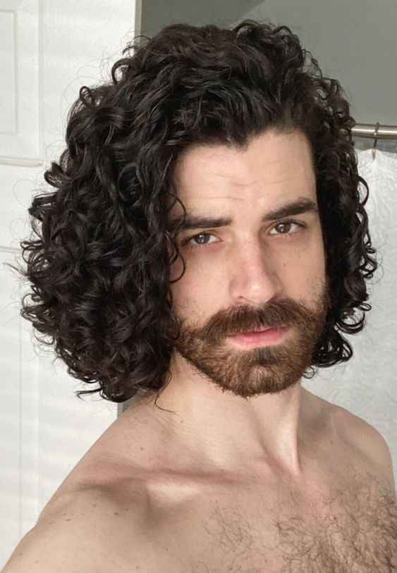 naked man with curly hair