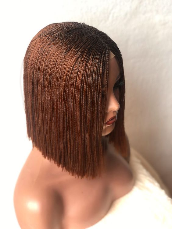 A blunt cut wig knitted on a mannequin