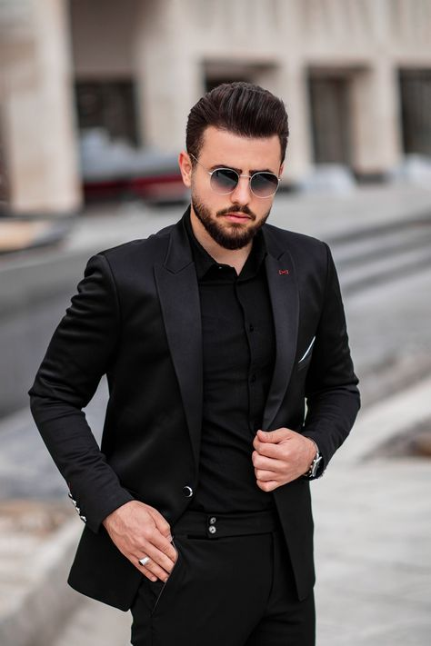 man in black suit with sunglasses